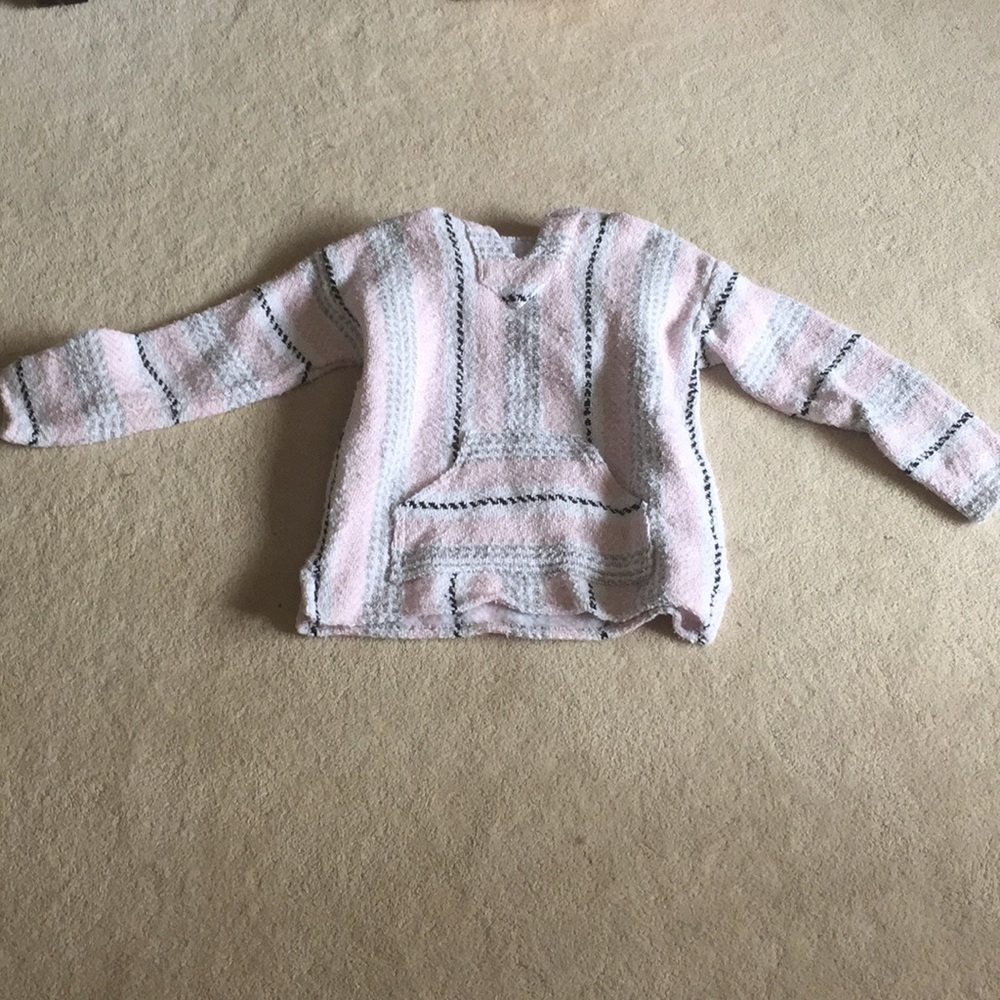 A girls rug like sweatshirt.